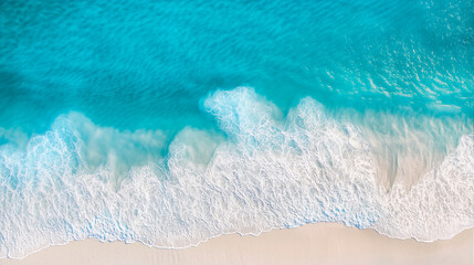 Fototapeta premium Sea background top view. Waves. Golden sandy shore. Ocean coastline. Blue lagoon. Deserted beach. Clear water surface.