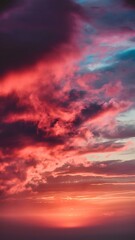 Fototapeta premium Colorful wallpaper purple orange blue pink sunset sky cloud. Dramatic sunset sky background. Sun Sets Over Horizon. Amazing Coral Pink Red Summer Cloud at Sunset. Beautiful Relax