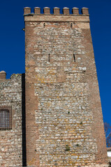Cortegana castle tower in huelva, andalusia, Spain. Blue sky in the background on a sunny day.