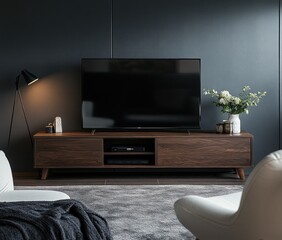 Modern living room with dark wood TV stand, flat-screen TV, and white armchairs.