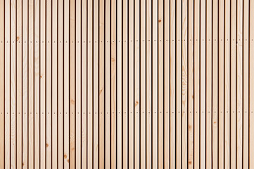 Light wood slats form a vertical repeating pattern.