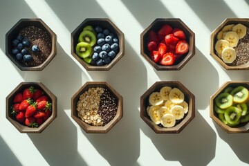 Overhead shot of eight wooden bowls filled with various fruits and chia seeds, oats.