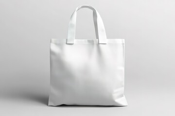 Blank White Tote Bag Mockup Against a Light Gray Background