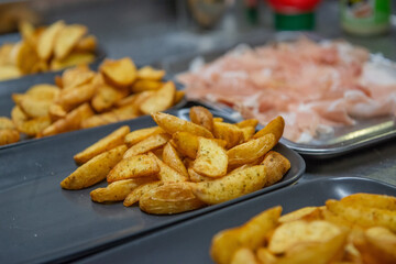 Meat burger bun with salad and mayonnaise