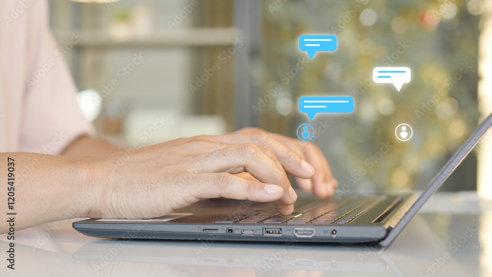 Aufkleber close-up of hands typing on a laptop keyboard with digital chat bubble icons hovering above, symboli