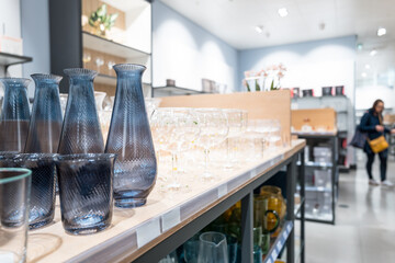Selection of fine crystal and general glassware seen on shelving within a well known British...