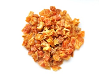 Pile of dried, sweet potatoes on a bright background.