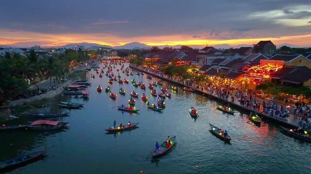 Hoi An ancient town at night. A beautiful night cruise decorated with Vietnamese paper lanterns Hoi An Ancient Town is a famous tourist attraction with its uniqueness, beauty and popularity in Vietnam