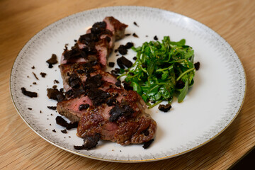 Tagliata di Manzo al Tartufo Sliced Beef Steak with Truffles Served with Green Rocket or Arugula Salad