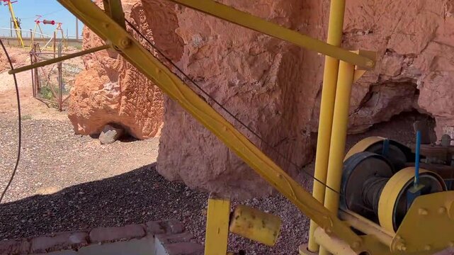 Coober Pedy, in South Australia, is the opal capital of the world, famous for its underground homes, churches, and shops built to escape the desert heat, offering a unique outback experience.