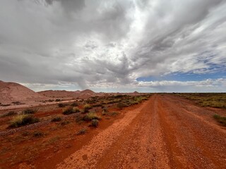 Coober Pedy, in South Australia, is the opal capital of the world, famous for its underground homes, churches, and shops built to escape the desert heat, offering a unique outback experience.