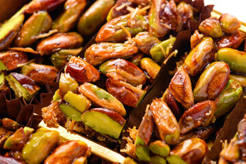 Sweet food Turkish delight, traditional food, crunchy pistachio bars, granola