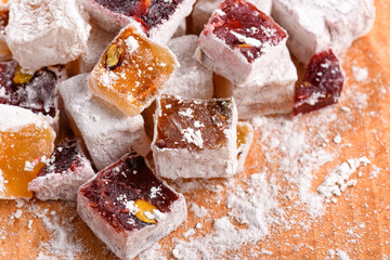 Sweet food Turkish delight, assorted rahat locum in form of cubes with nuts and powdered sugar, traditional food