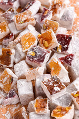 Sweet food Turkish delight, assorted rahat locum in form of cubes with nuts and powdered sugar, traditional food