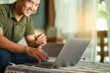 asian man work using computer hand typing laptop keyboard contact us.student study learning education online.adult professional people chatting search at office.concept for technology device business