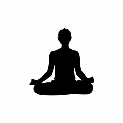 A person is sitting cross legged in a lotus position. The person is wearing a black shirt and black pants