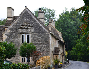 Fototapeta premium Cotswold stone house in the village of Castle Combe, Cotswolds, Wiltshire, England, UK