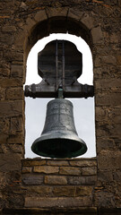 Obraz premium An old bell at the top of an old church.