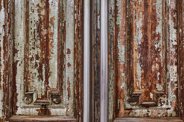 old wooden beautiful door. an apartment building.