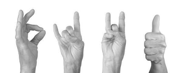 Elderly woman's hand showing rock horn gesture with thumb up, wrinkled skin, expressive sign of approval or agreement, grayscale tones. Isolated on white background.