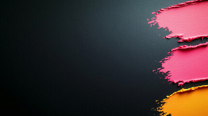 Vibrant pink and orange paint strokes on dark background create striking contrast, showcasing artistic expression and creativity