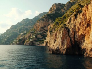 Naklejka premium A Stunning Cliffside View with Coastal Homes and the Deep Blue Sea