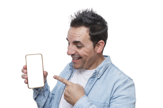 Man smiles while pointing at a blank smartphone screen in a bright setting, showcasing excitement and engagement
