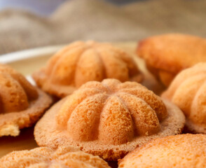 Side view and crop Thai egg cake with or as it is known in Thai, Khanom Khai, Made by baking, it is crispy on the outside and soft on the inside.