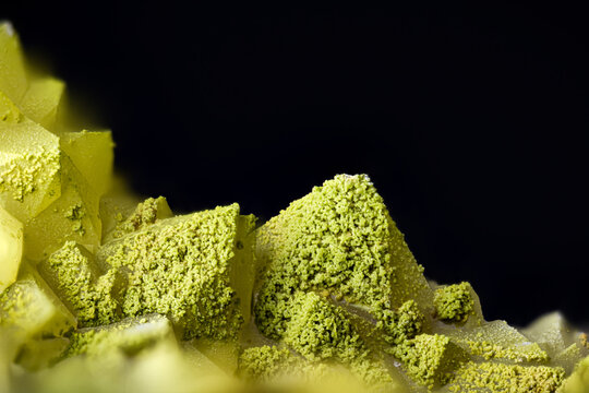 green Chenevixite on quartz. Specimen from clara mine, oberwolfach, Germany. Micro photography extreme close-up. microscope mineral crystal photography for Scientific use.
