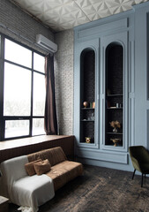 Elegant living room with big window, blue walls, and a stylish decorative shelves