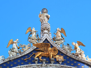 Sculptures on the facade of basilica di san marco or st. marks church in Venice Italy