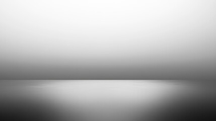 Pale gray gradient transitioning from darker to light monochromatic abstract background