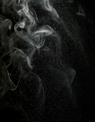 Dark, moody grunge texture featuring smoke-like patterns, scattered dust particles, and subtile grain