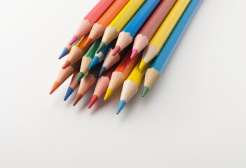 Fototapeta premium Close-up of multicolored pencils on a white background