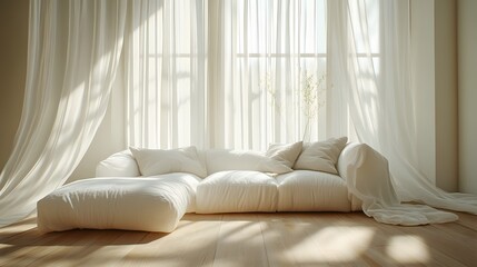 Fototapeta premium Modern interior displays elegant white sofa with flowing sheer curtains, natural sunlight streaming through windows, creating airy atmosphere in minimalist living space.