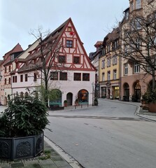 Naklejka premium Old town of Nuremberg, with an old brick building in the center on a cold day in december