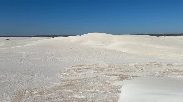 Lancelin, a coastal town in Western Australia, is famous for its white sand dunes, perfect for sandboarding, off-road adventures, pristine beaches, windsurfing, and a relaxed atmosphere.