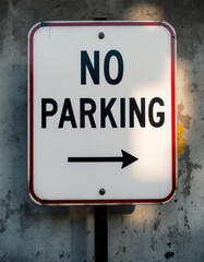 Obraz premium A clear, weathered no parking sign with right arrow, mounted on concrete wall