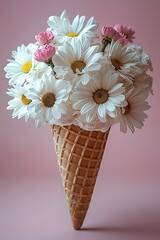 An ice cream cone filled with a bouquet of fresh daisies