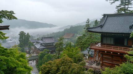 Misty Mountain Temple Vista Overlooking a Tranquil Town in Japan at a Distance