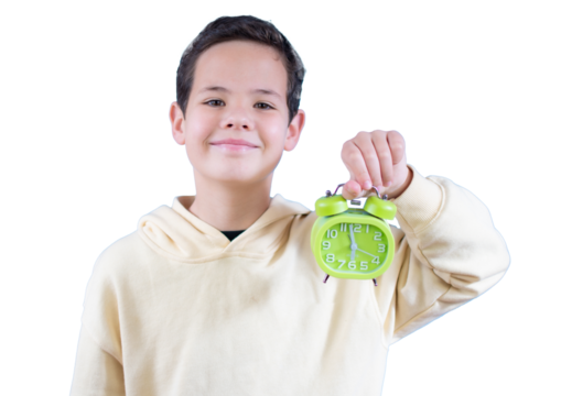 Portrait of a smiling child boy holding an alarm clock isolated over transparent background. PNG transparent.