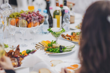 Festive table with food in a restaurant. Table set for an event party or wedding reception