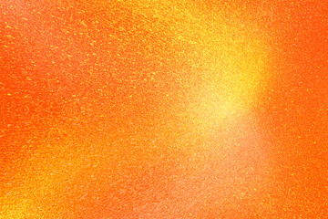 Orange glitter paper texture background with space. glitter star effect just like space. night sky...