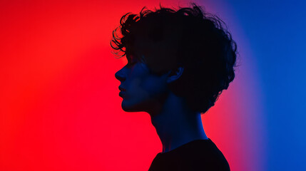 Silhouette of Man Against Bright Colorful Gradient