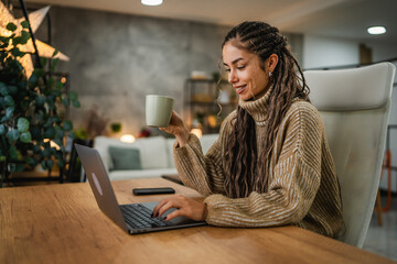 Fototapeta premium beautiful woman enjoy at coffee break while work from home