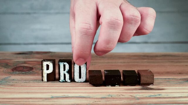 PRODUCT. Spelling word using wooden alphabet blocks