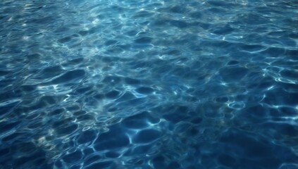 Obraz premium The​ metal​ texture​ of​ surface​ blue​ water​ reflected​ by​ sunlight​ for​ background. Blue​ water​ texture​ in​ the deep​ sea​ for​ background. Reflection​ on​ surface​ blue​ water. Blue​ water​ 