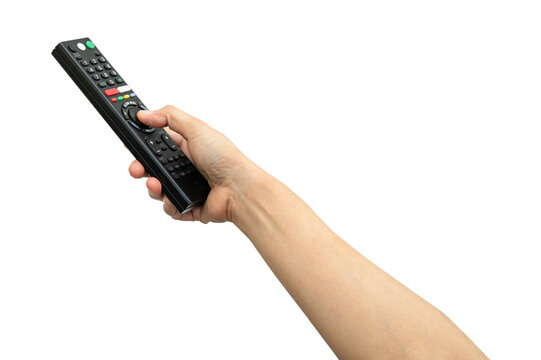 Asian woman use finger of left hand to press button on television remote control isolated on white background with clipping path.