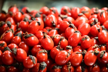 Cherry tomatoes with preserved fruit are a cherished Taiwanese treat. The tangy sweetness of preserved fruit perfectly complements the juicy freshness of tomatoes, creating a snack full of nostalgia.