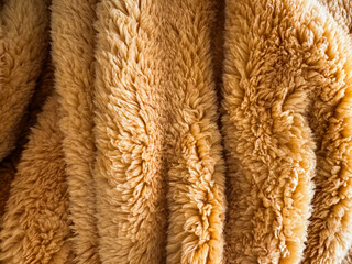 Soft and cozy furry blanket draped elegantly on a surface
